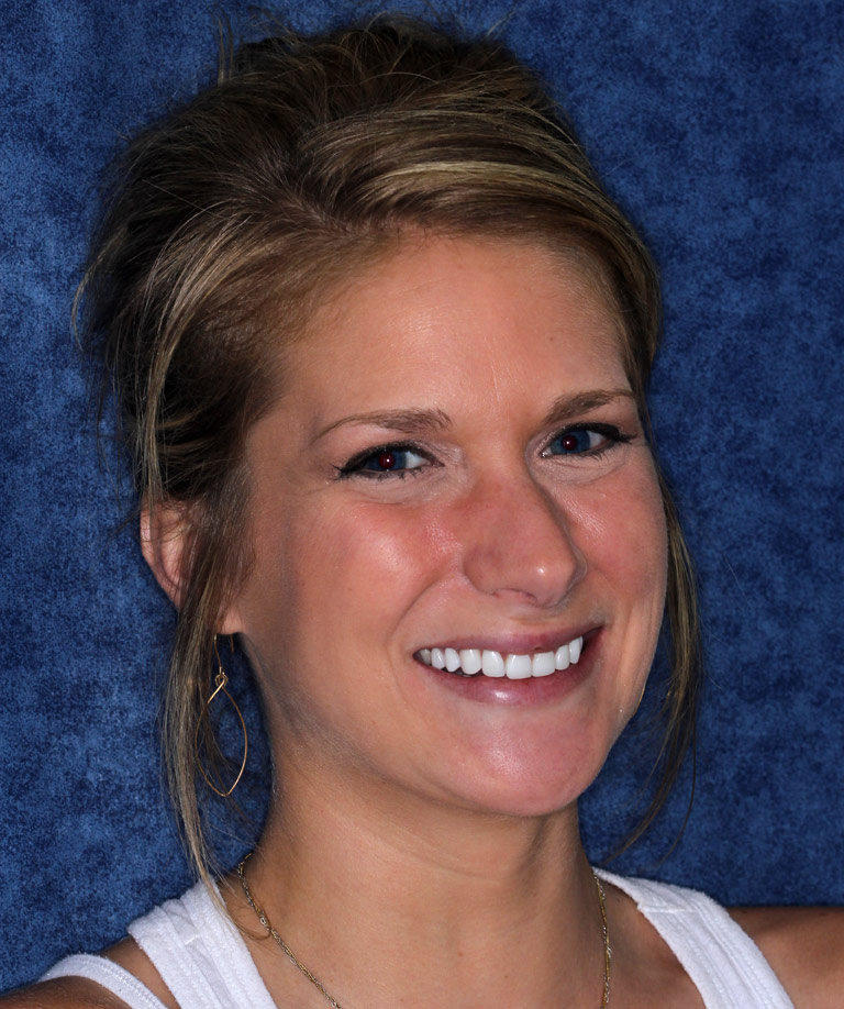 Headshot photo of Tori smiling showing smile makeover results from Dr. Brooksher